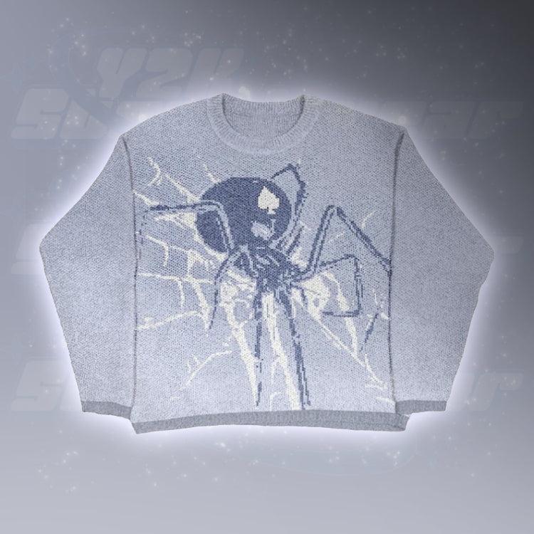 Pull toile d'araignée